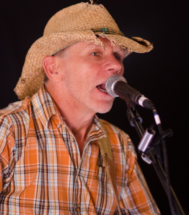 Kelly Cork, lead vocals and guitar of "The Rain"