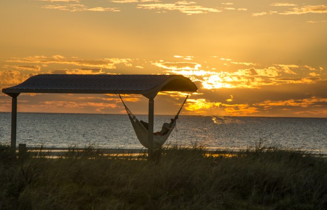 A sunset, a hammock, and a tropical beach ..what else could you want ?