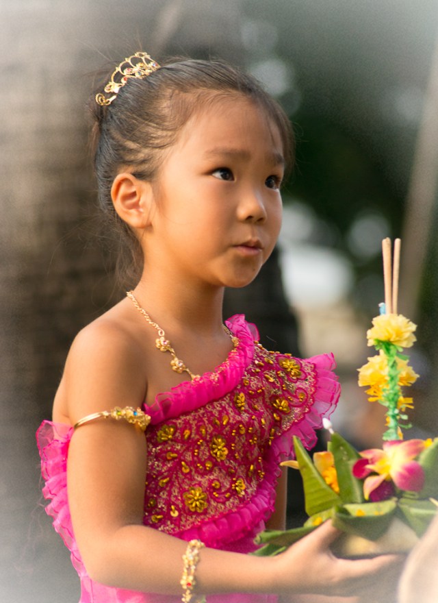 Young girl in traditional dress at Loy Krathong
