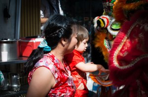 feed the lion 20 baht and it will give you a "lucky " orange.